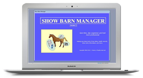 laptop with screenshot of Show Barn Manager software